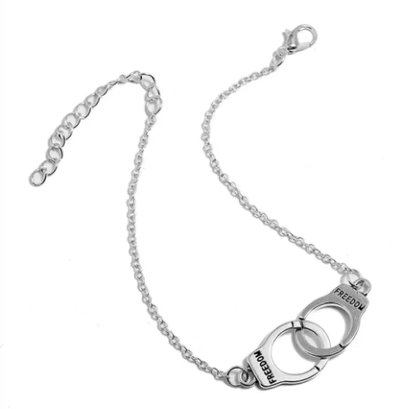 Silver geometric alloy anklet on ankle, 18cm length, simple electroplated finish