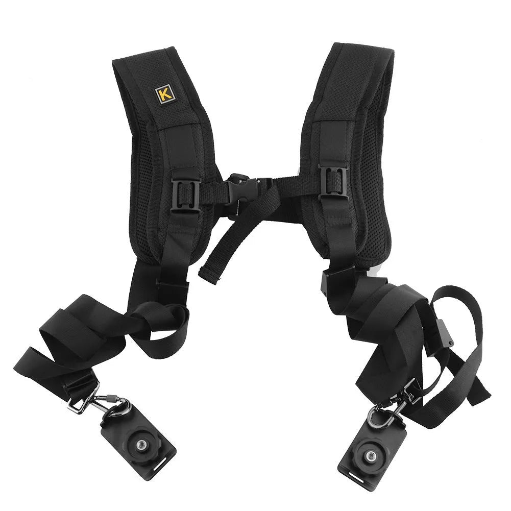 Black professional dual SLR camera harness with shoulder padding shown on a person.