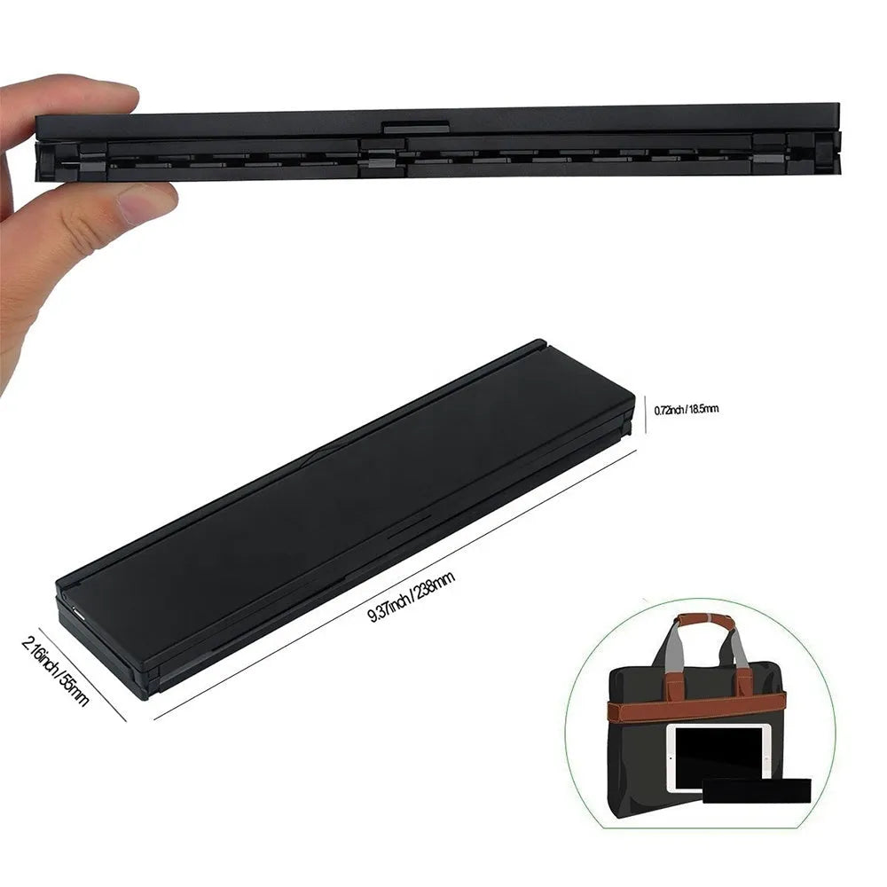 Mini folding ultra-thin wireless Bluetooth keyboard in black, open and ready for typing with a tablet