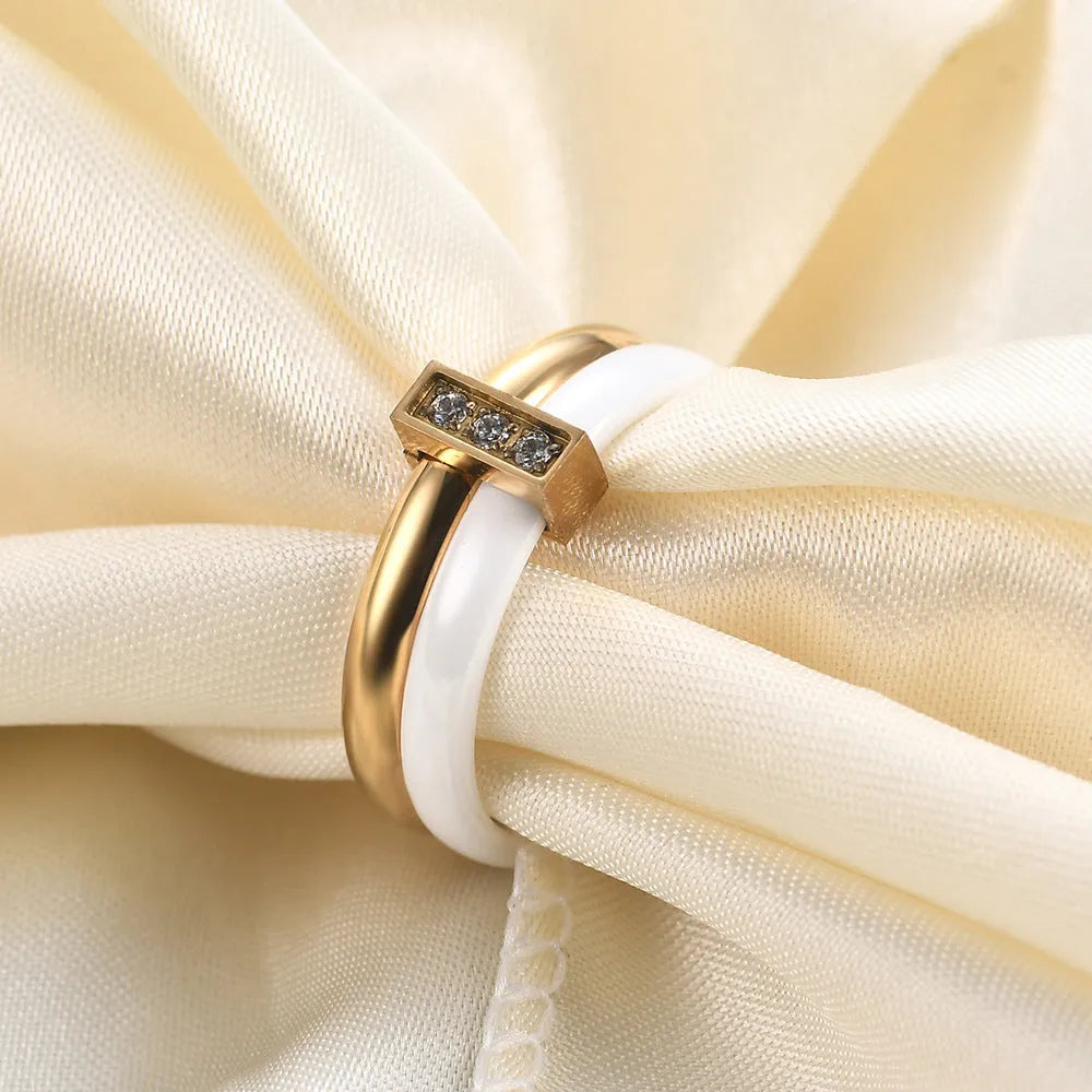Glossy ceramic ring with zirconium stitching in geometric round shape, steel black colour option