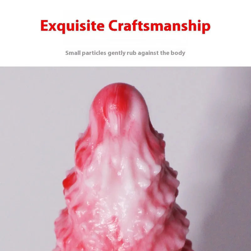 Pink platinum silicone penis-shaped women's masturbator sex toy on a plain background.