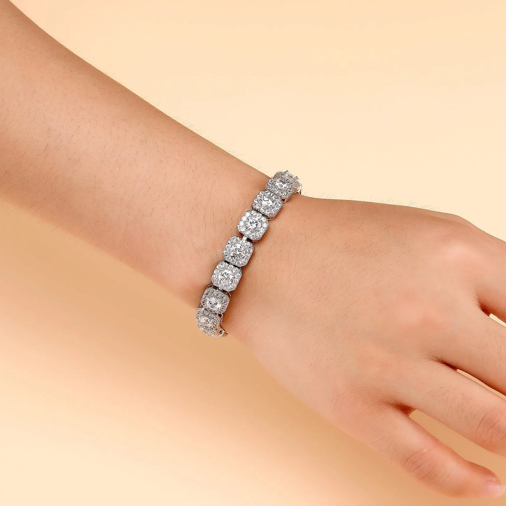 Men's silver zircon flip Cuban chain bracelet on wrist showing inlaid zircon and clasp detail