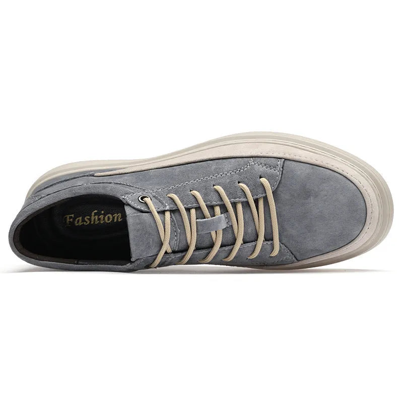 Men's grey low-top casual leather skate shoes with a round toe and flat rubber sole.