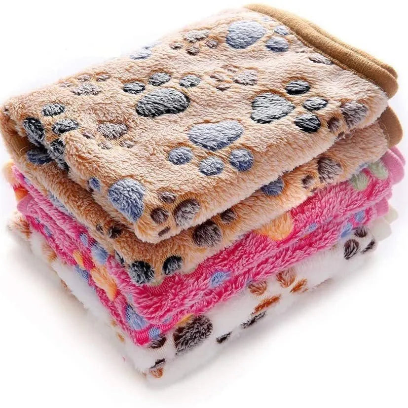 Coral fleece pet blanket with dog paw print pattern in beige, multiple sizes available