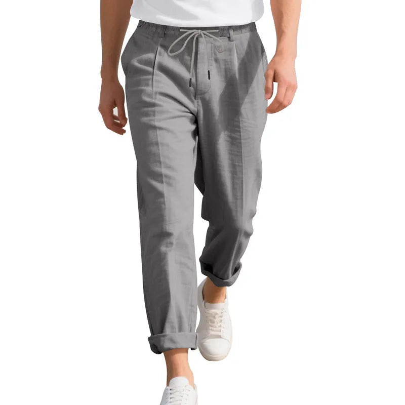 Men's linen casual trousers with drawstring waist in straight leg style for summer wear