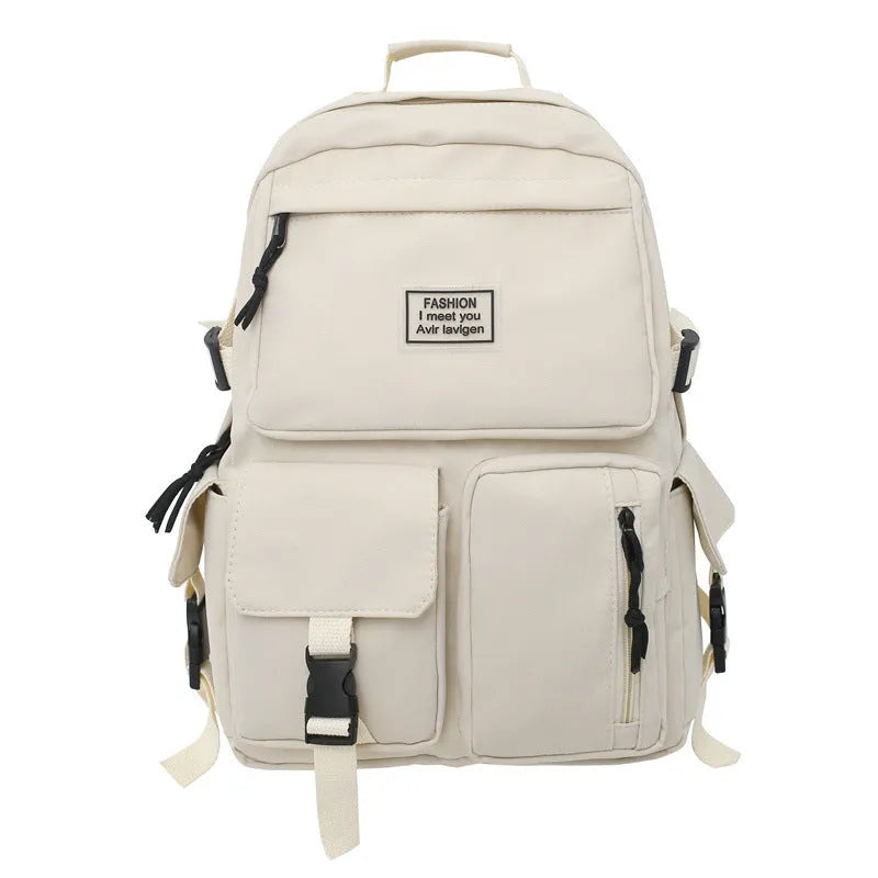 Black and white student nylon backpack with laptop compartment and outer pockets.