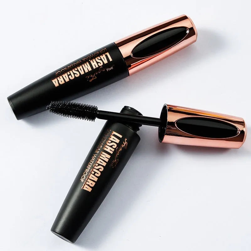 Black waterproof and sweat-proof mascara tube showing thick curling formula application