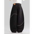 Black Pu Shuai straight-leg denim trousers with a mid waist and zip fly, laid flat.