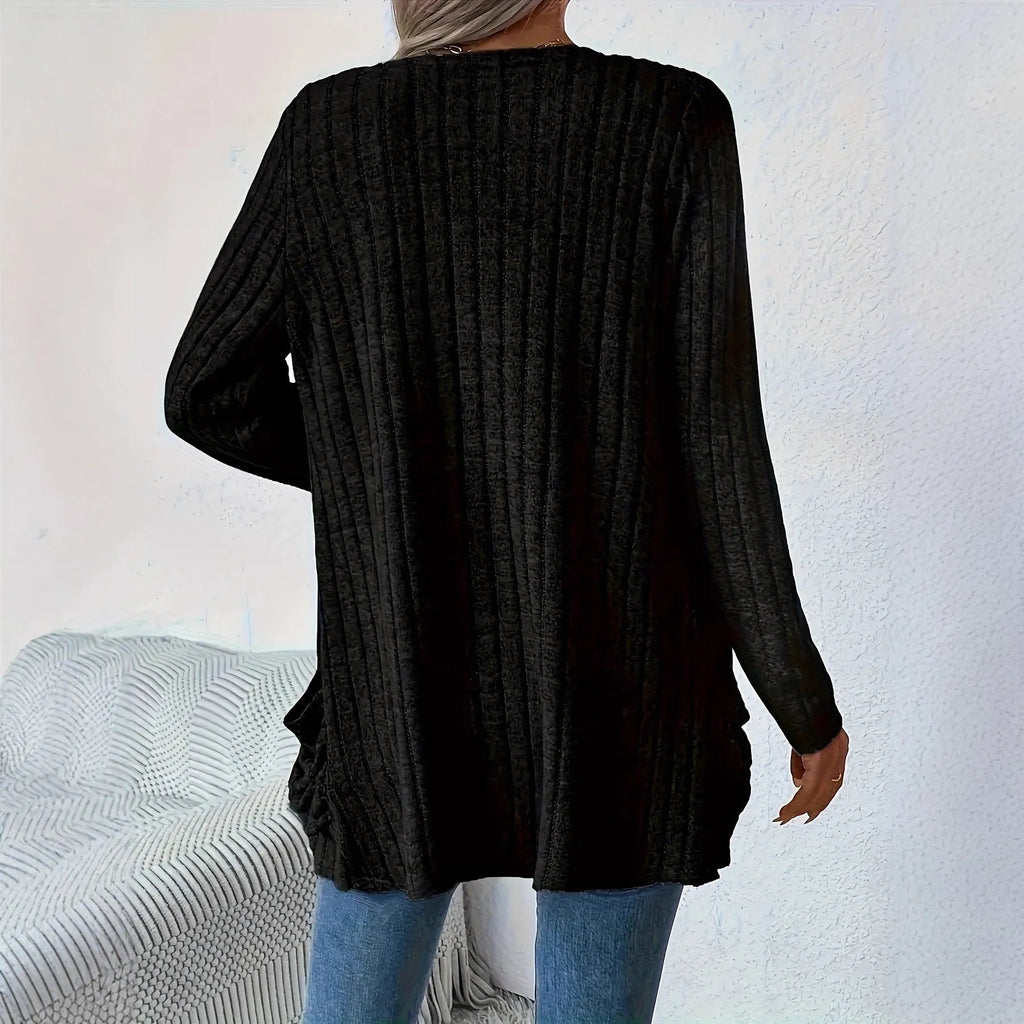 Solid colour long sleeve cardigan with front pockets, loose fit polyester knitwear