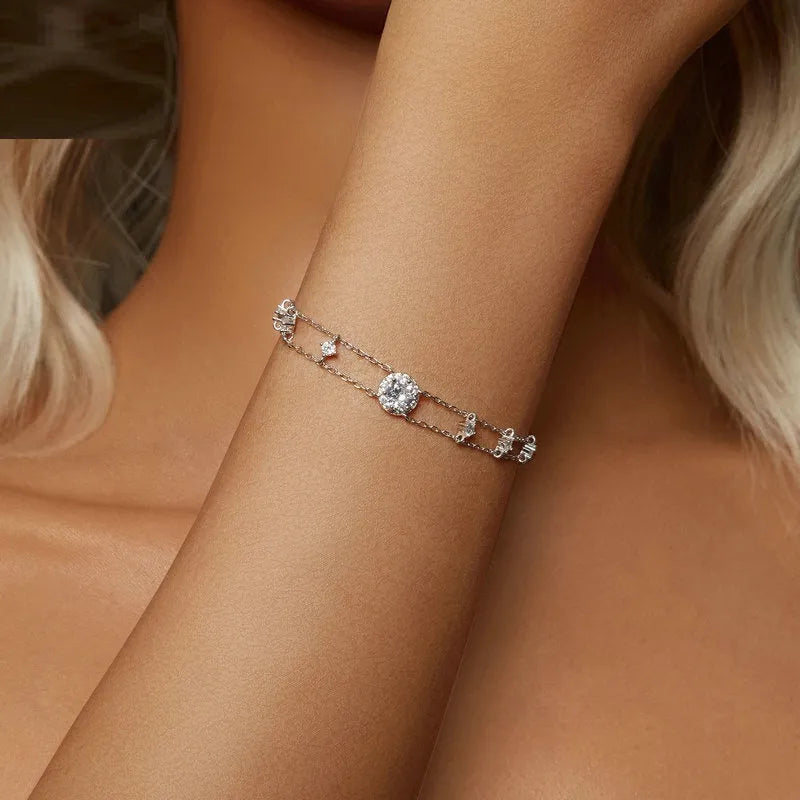 S925 silver diamond bracelet with 50 point round gemstone and electroplated finish on wrist