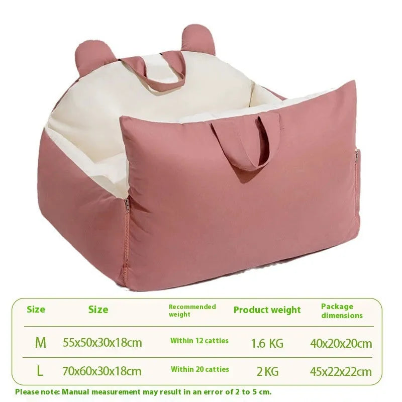 A removable washable dog car kennel in a beige colour, shown in a vehicle boot.