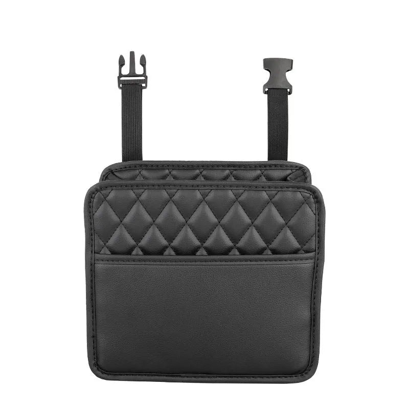Leather hanging car storage bag and trash can in black, shown mounted behind a car seat