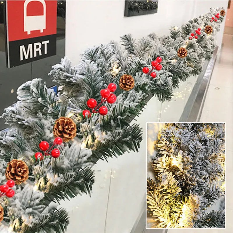 White flocked Christmas rattan vine garland on a wooden mantelpiece