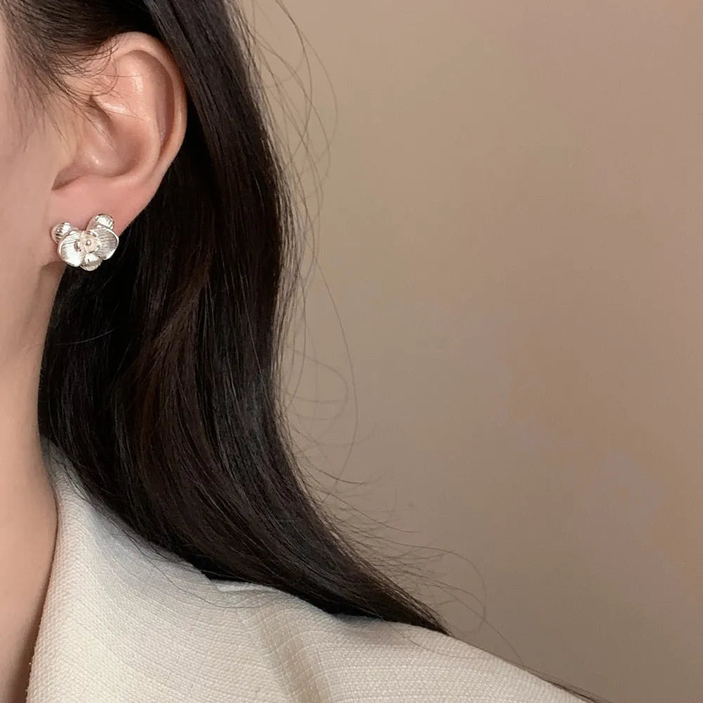 Retro flower earrings for women in gold or silver electroplated copper with petal detailing