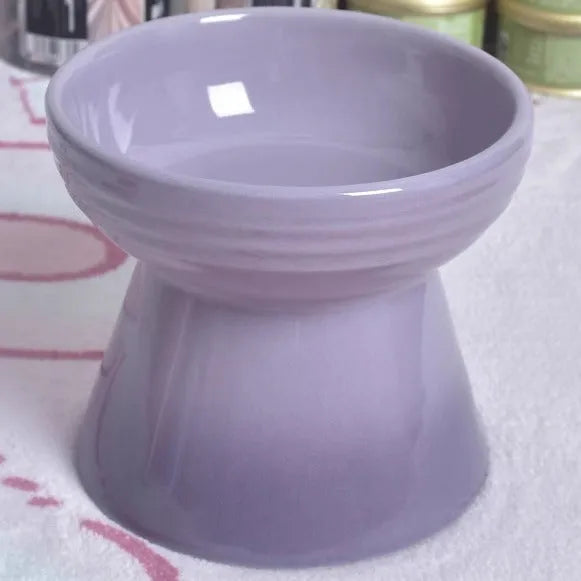 Ceramic pet bowl with high foot and black chin design for cats and dogs