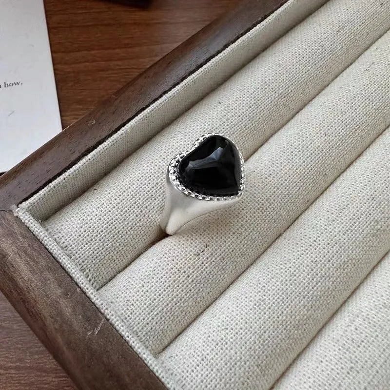 S925 sterling silver adjustable ring with a heart-shaped black agate stone.