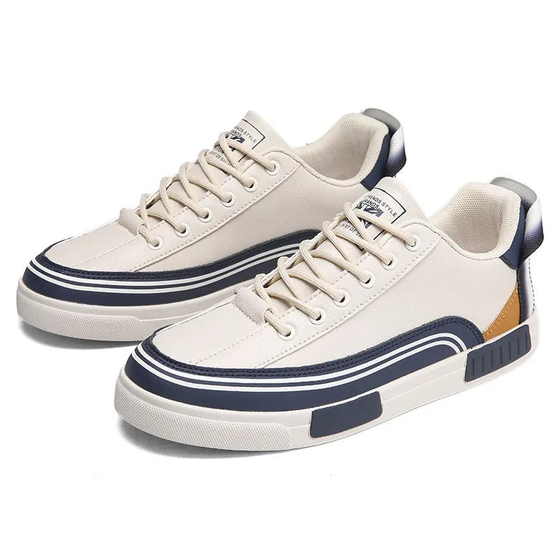 Men's beige and white and green canvas casual shoes with mesh sections and a round toe.