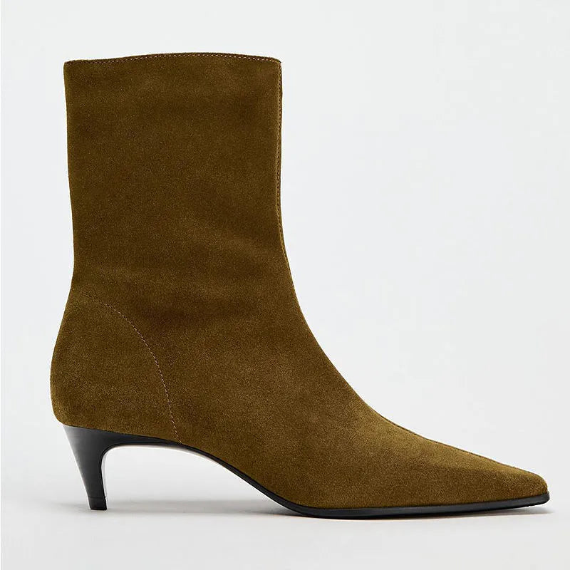 Brown square toe high heel boots with side zipper and a kitten heel on a waterproof platform sole.