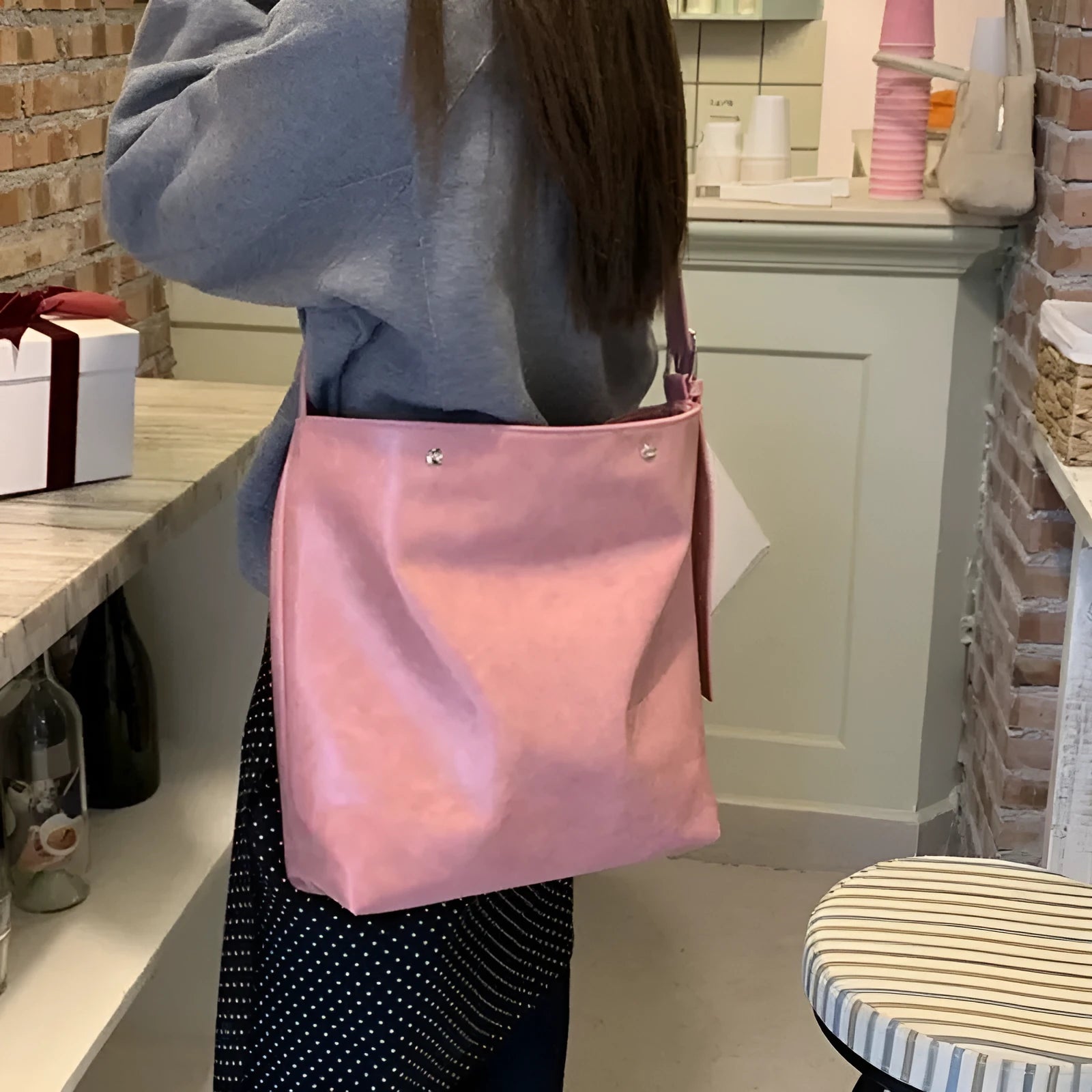 Corduroy one-shoulder commuter bag in pink colour with structured bottom