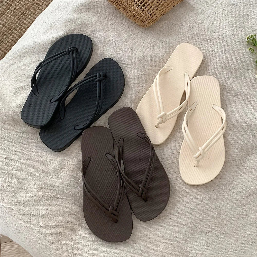 PVC casual flip flops in a toe-covering style on a plain background, showing the one-piece moulded construction.