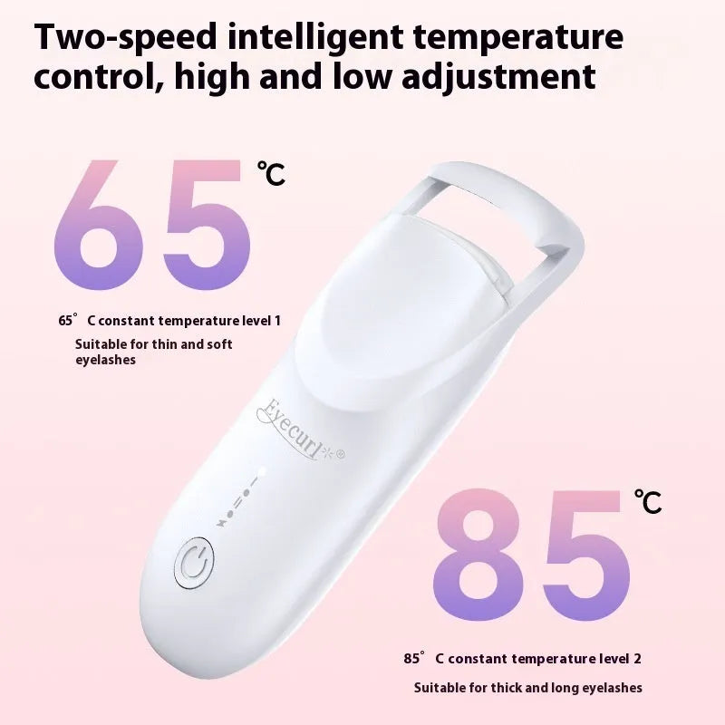 USB-charged electric heating eyelash curler in plastic casing on a white background