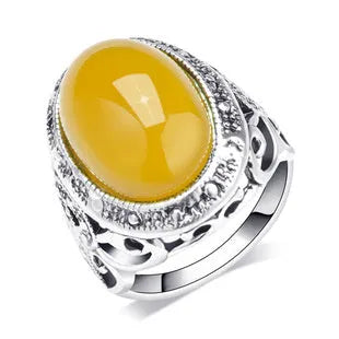Geometric alloy ring with fluorescent beeswax plating in antique silver amber finish