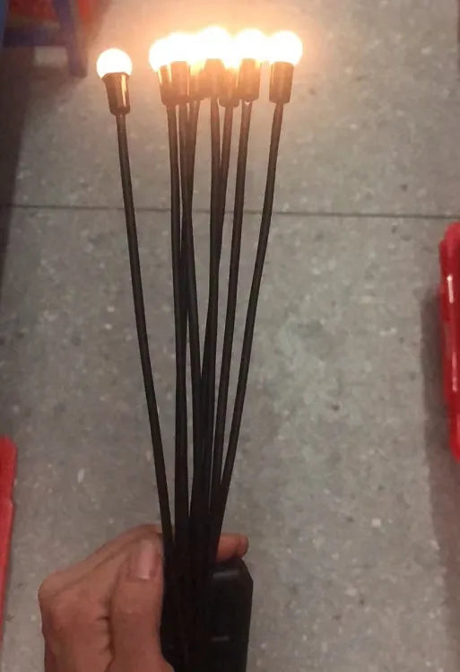 Solar-powered LED ground spike garden light with multiple head cluster options