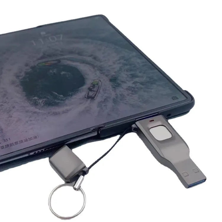 Fingerprint-protected USB flash drive with USB 3.0 and USB-C connectors in metal shell