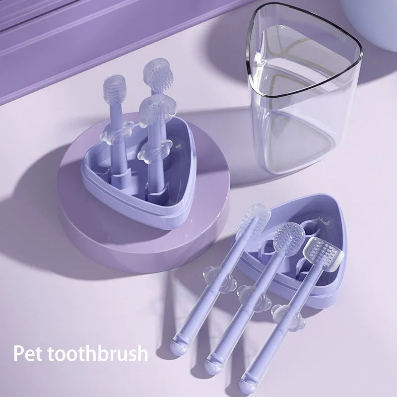 Soft silicone pet toothbrush for dogs and cats in blue, green, and purple colours.