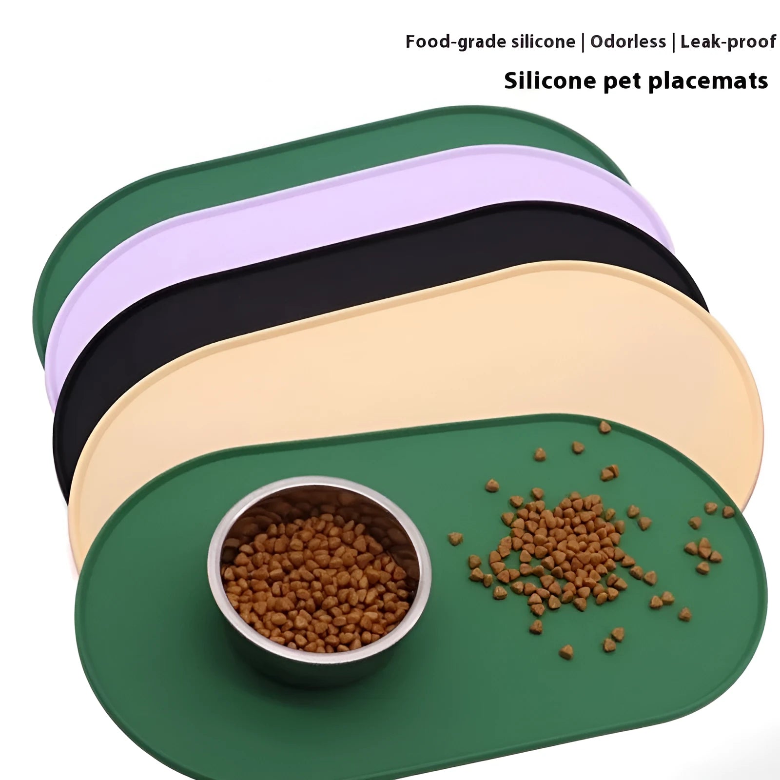 Green silicone waterproof placemat for cat bowls on a wooden floor.