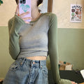 Women's dark blue viscose slim-fit top with princess sleeves and embroidery, shown in an oversized short-length design.