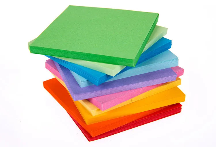 Assorted colour mini paper scrolls with metal eyelets in sizes 5x5cm, 3x7cm, 4x7cm, and 7x7cm for drift bottle messages.
