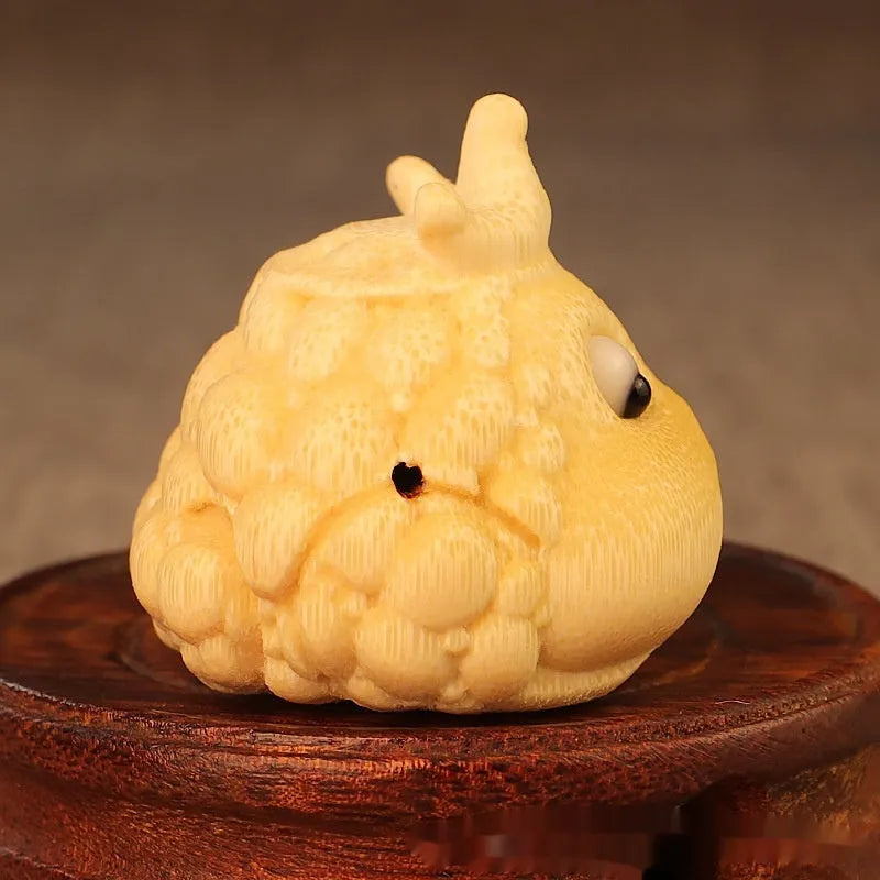 Solid bamboo carving of a Crown Princess Toad hand ornament in cute style.
