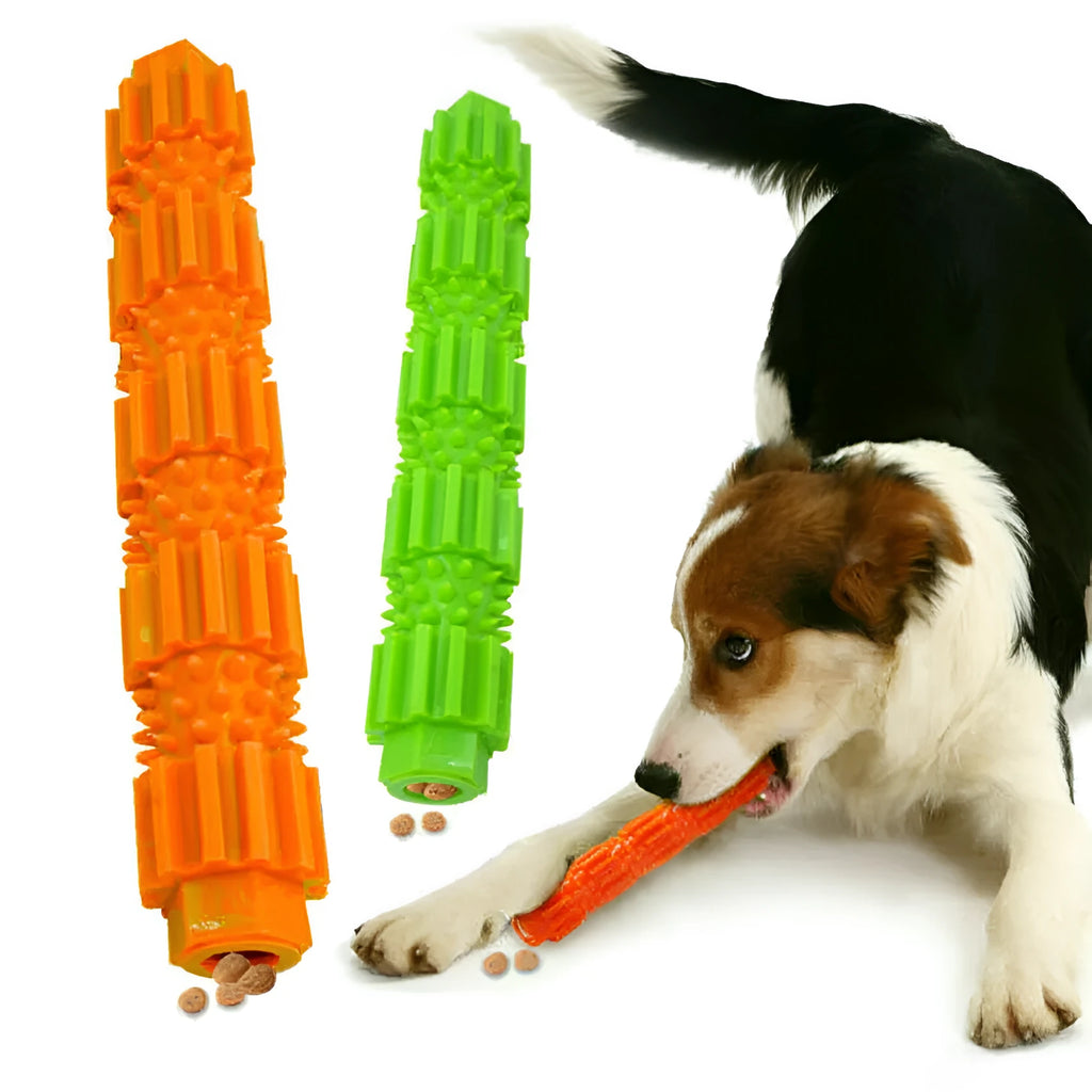 Green and orange rubber dog chew toy with treat dispensing opening and textured surface for aggressive chewers