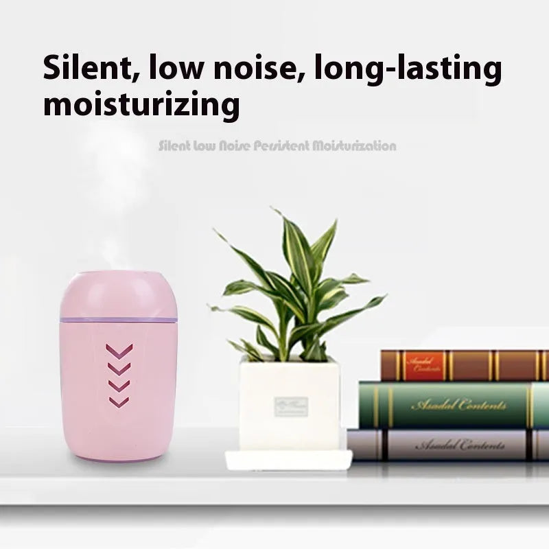 Round desktop air purifier with aromatherapy in blue, showing single fog outlet and USB cable