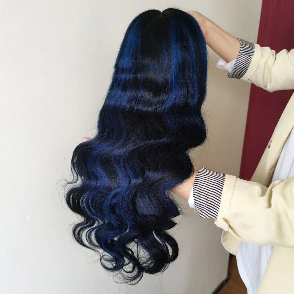 A woman wearing a real human hair lace front headgear with a 4x4 lace construction and long, styled hair.