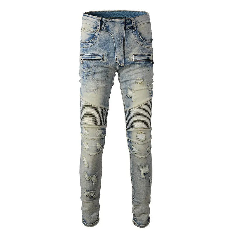 Men's light blue distressed slim fit jeans with hand-frayed detailing and stretch denim fabric