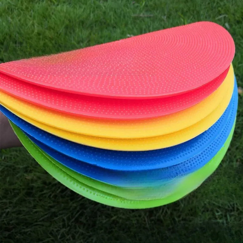 Soft TPE football training target pad measuring 23cm in diameter, available in six bright colours