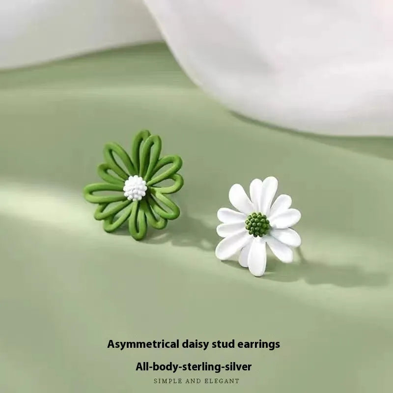 Cartoon-style flower alloy earrings in blue and orange, white and green, and yellow and white two-tone colour options