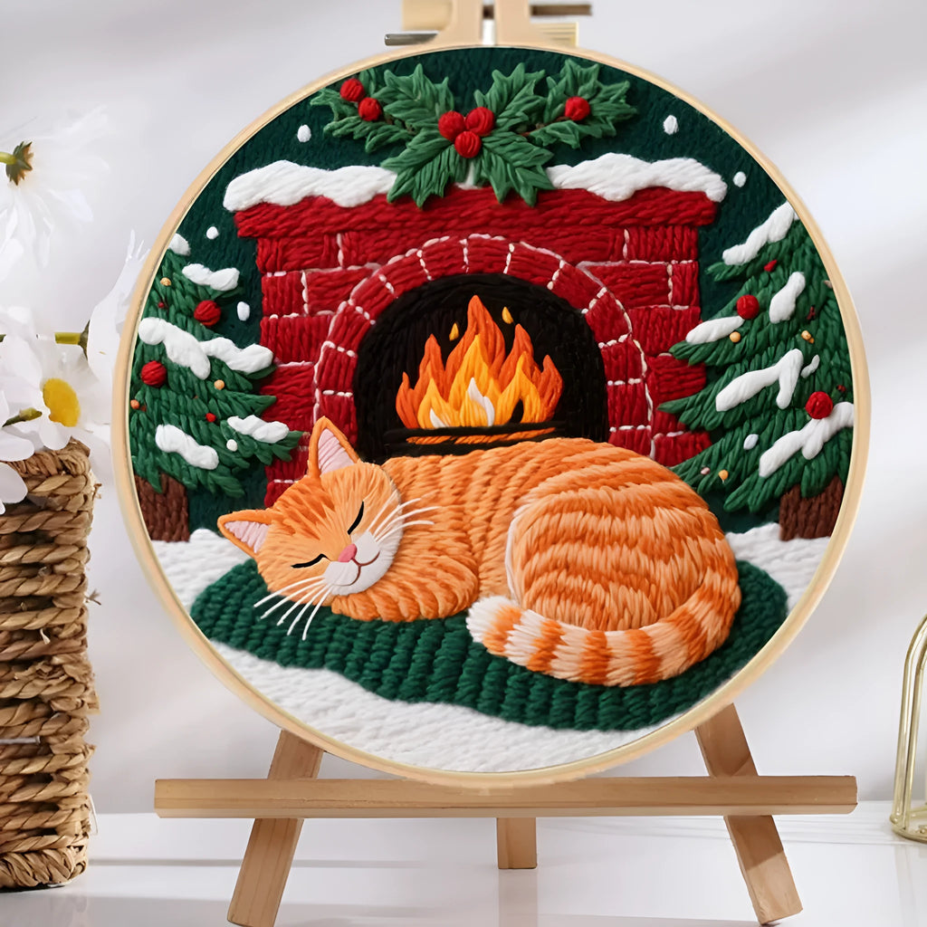 Cat embroidery DIY material kit with cotton linen fabric, 20cm bamboo hoop, and scissors on a table.