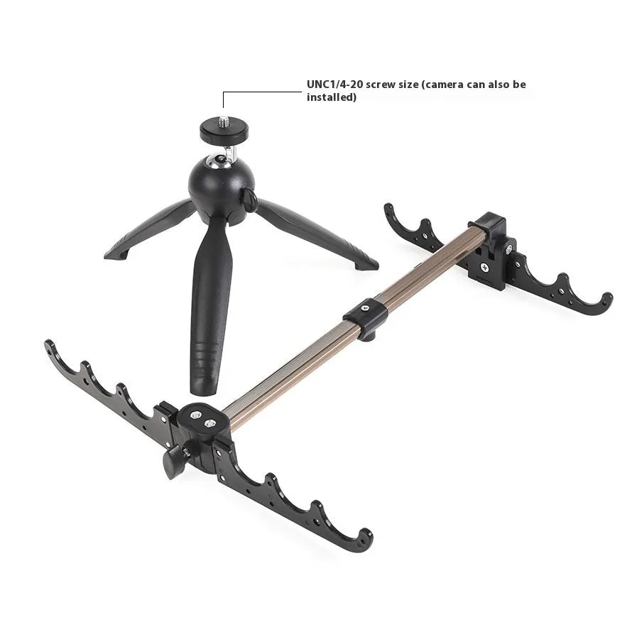 Aluminium ice fishing tripod rod holder bracket on ice.