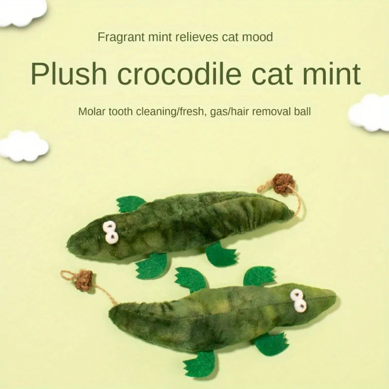 Green plush alligator cat toy with plant-based catnip and peppermint scent for oral cleansing