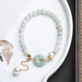 Handmade jade bracelet for women with natural emerald peace buckle and round pendant