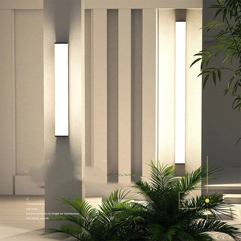 60cm tall outdoor wall light with stainless steel construction and polycarbonate components, wall-mounted with IP65 waterproof rating