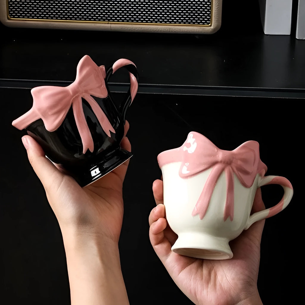 Ceramic mug with girl heart bow decoration in white powder or black pink colour, 301-400ml capacity.