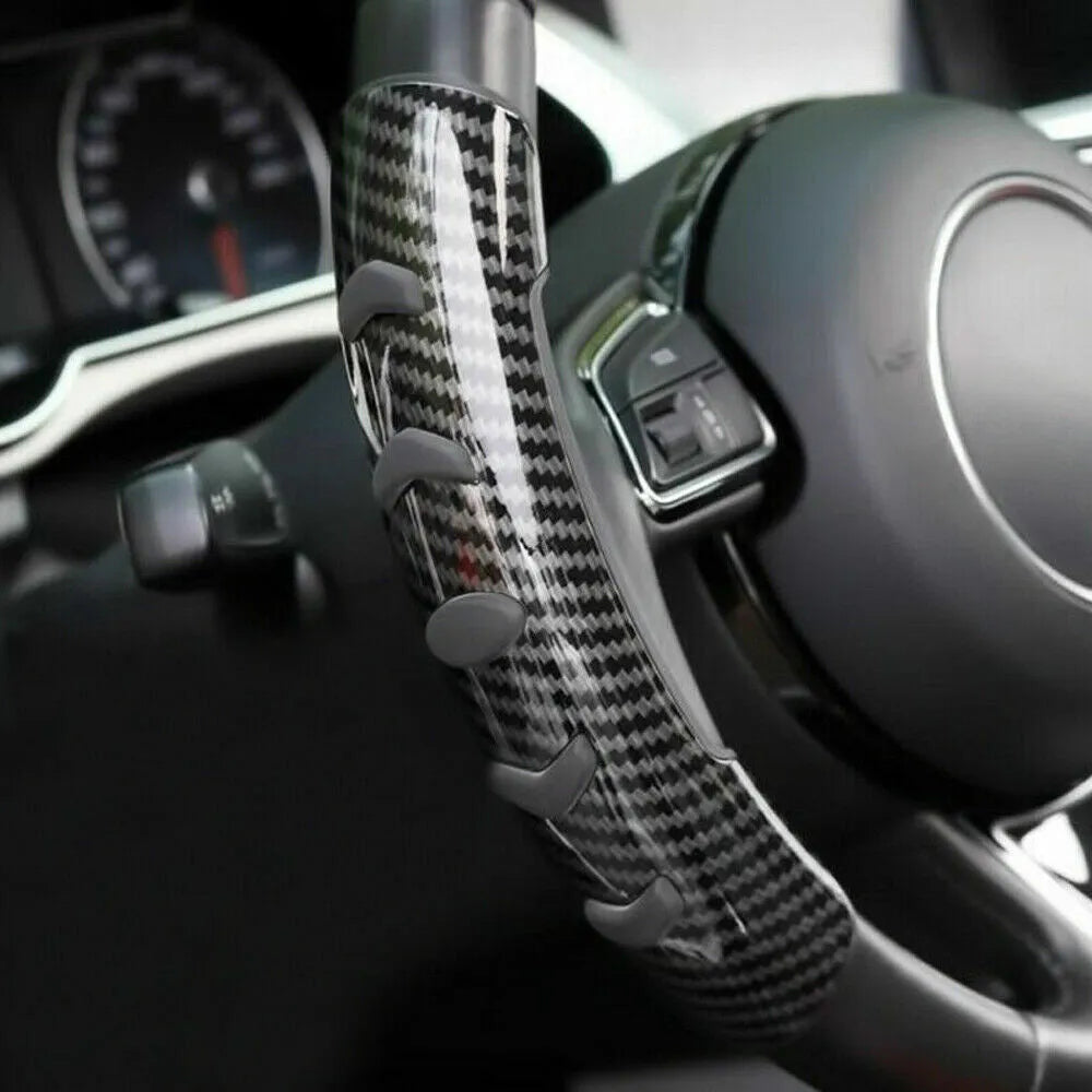 Carbon black fibre steering wheel anti-skid sleeve showing textured surface and 38cm diameter