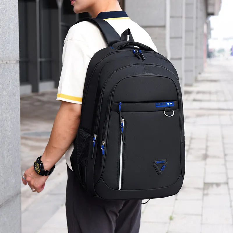 Men's Oxford cloth schoolbag in multiple colours showing large capacity and air pillow belt design
