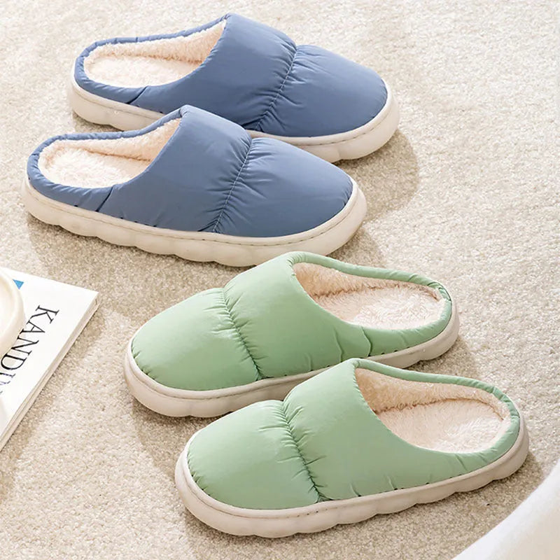 Pair of down cotton winter slippers with a thick rubber non-slip sole, shown in a choice of colours.