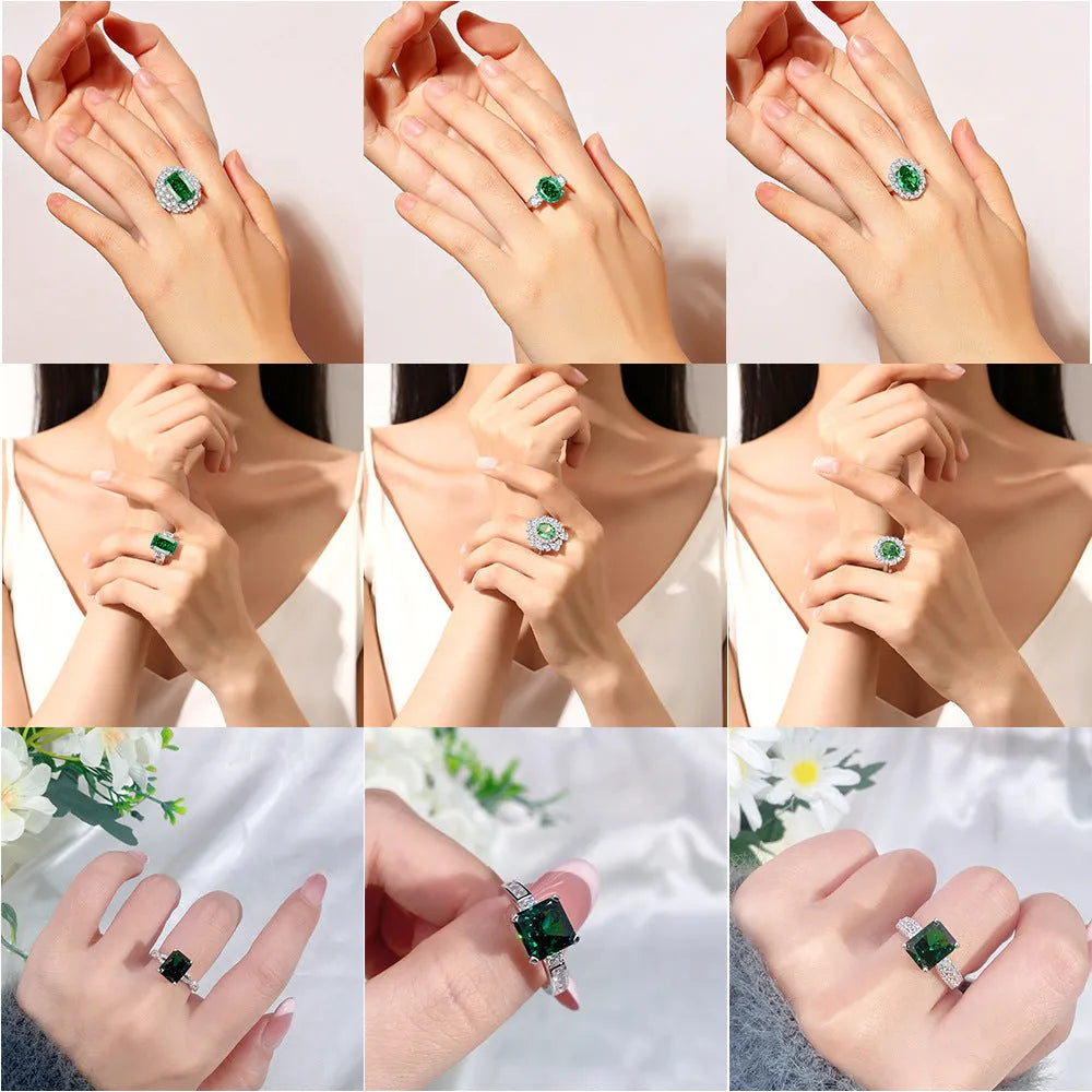 Women's oval emerald and diamond ring in sterling silver on a hand.