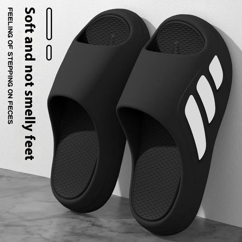 Men's EVA flip flops with letter print, brown colour, on a wooden floor